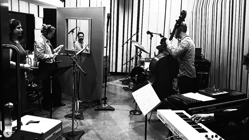 J Rowe and Jordan Schug perform at Rustbelt Studio along with other muscians
